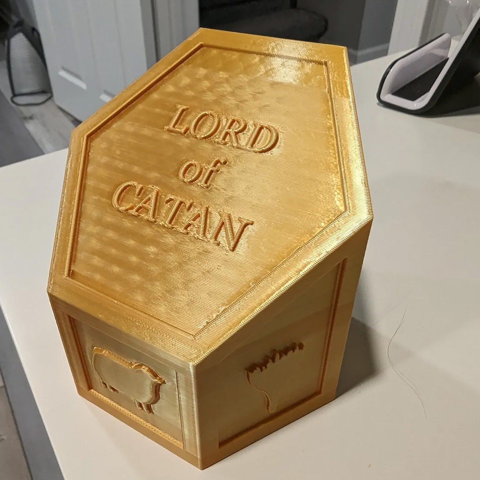 a gold box sitting on top of a table