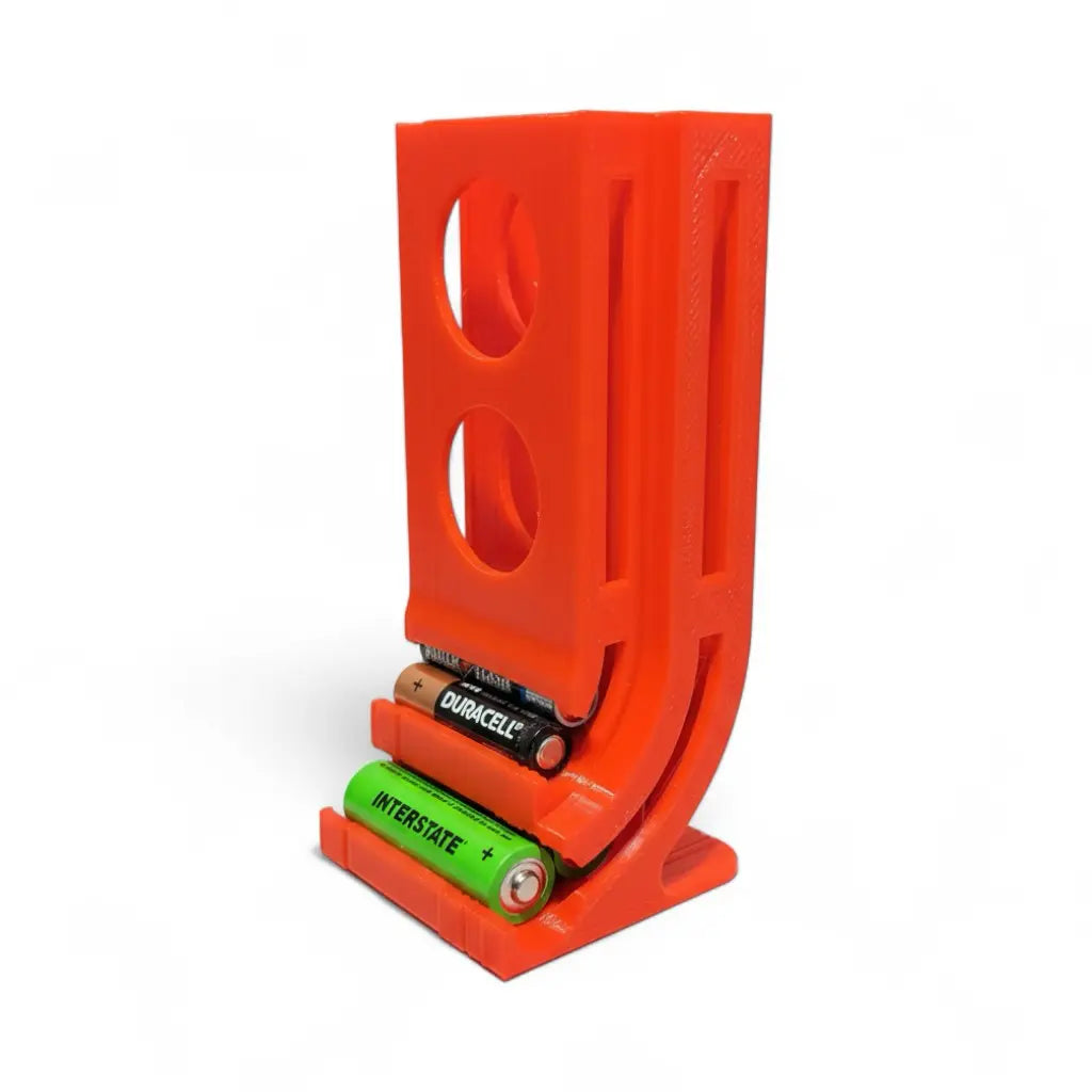 Desktop battery dispenser tower holding 10 AA and 10 AAA batteries