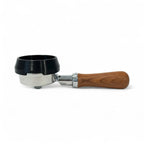 Dosing funnel sitting on a 58mm espresso portafilter basket rim