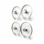 Wall mounted pot lid holder on a cabinet side holding a glass lid upright, view 2
