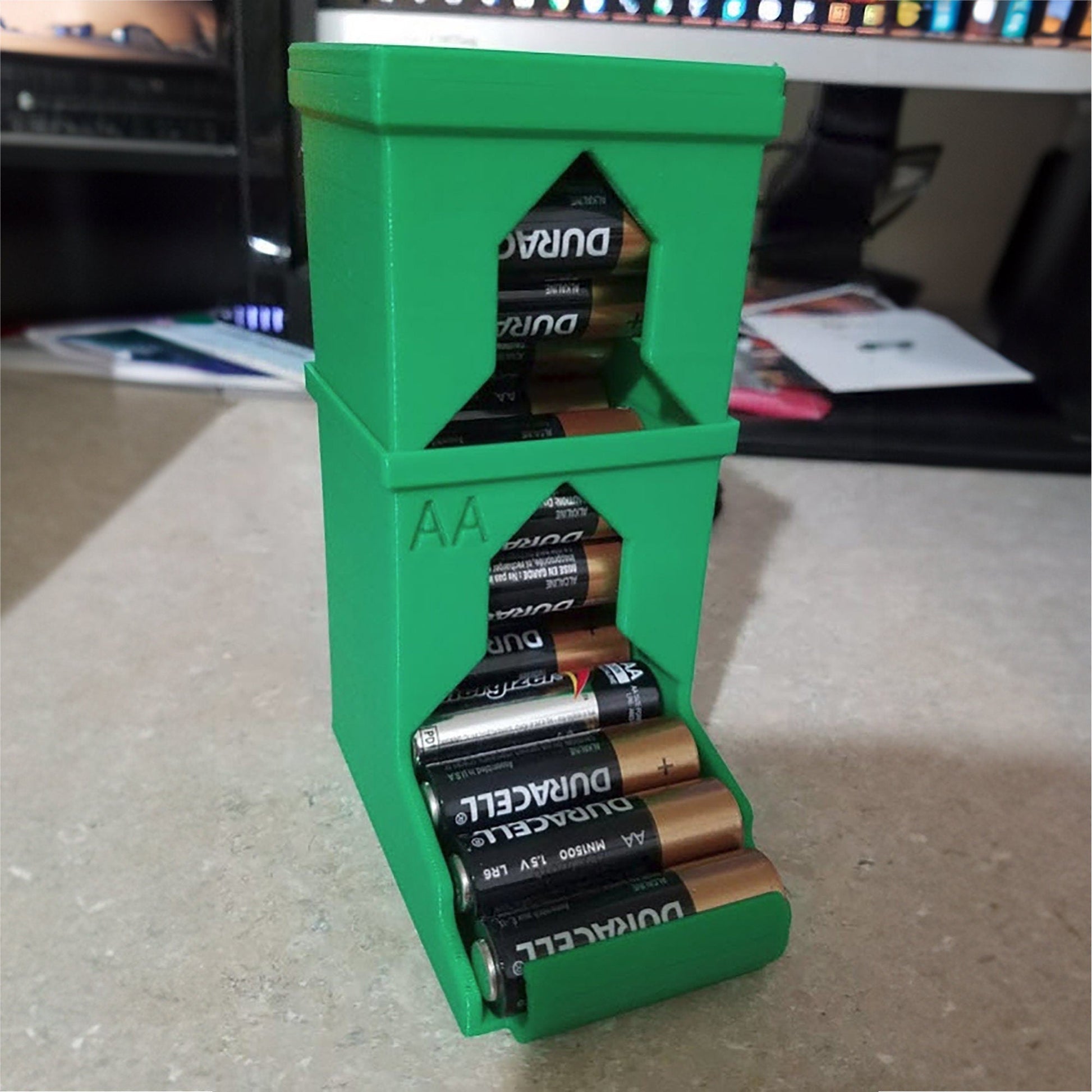 a stack of batteries sitting on top of a counter