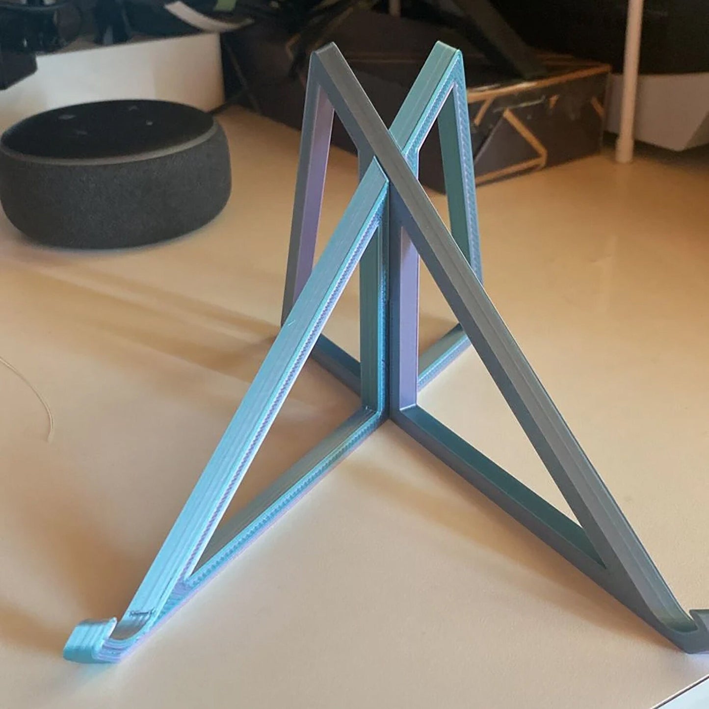 a wooden triangle sitting on top of a table