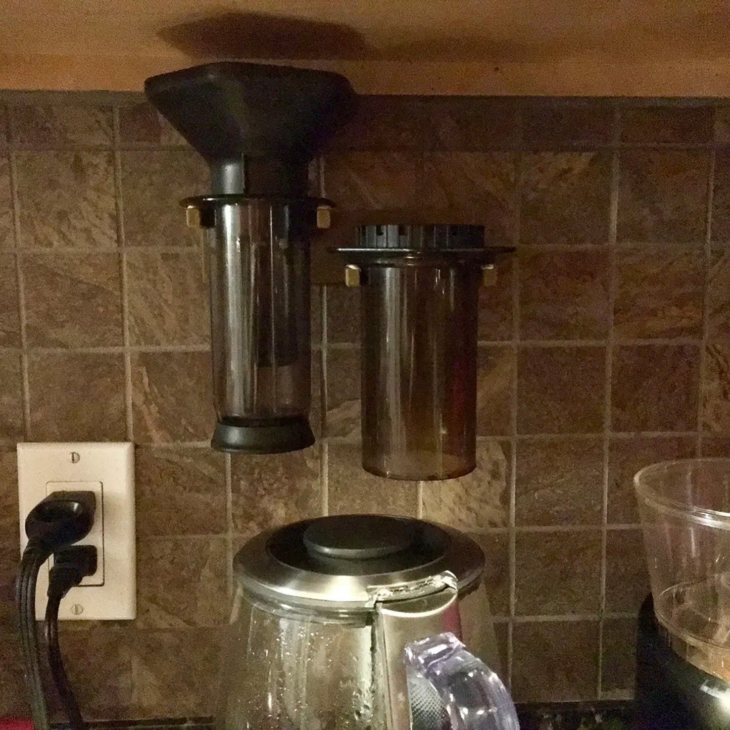 a coffee maker sitting on top of a kitchen counter