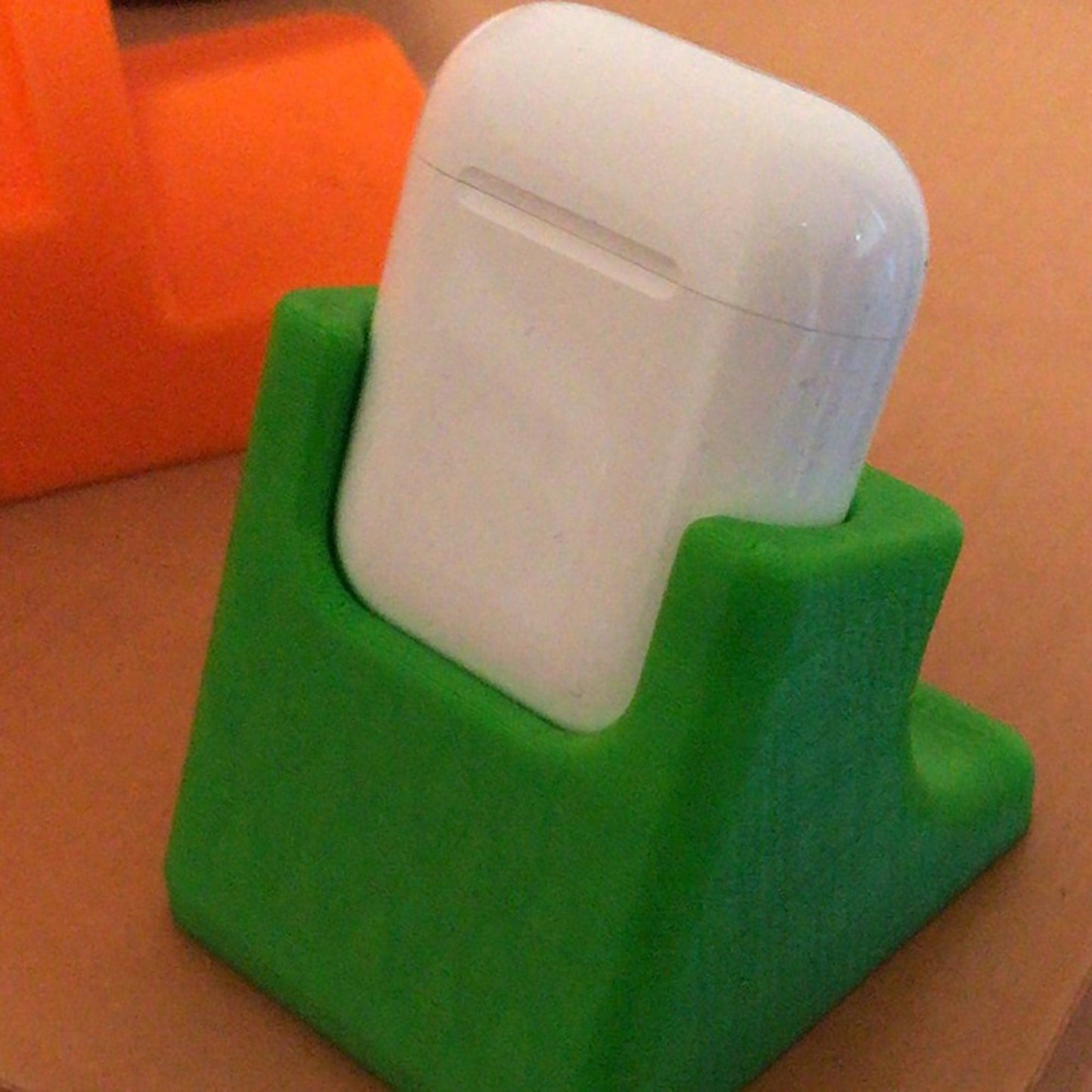 a green and white object on a table