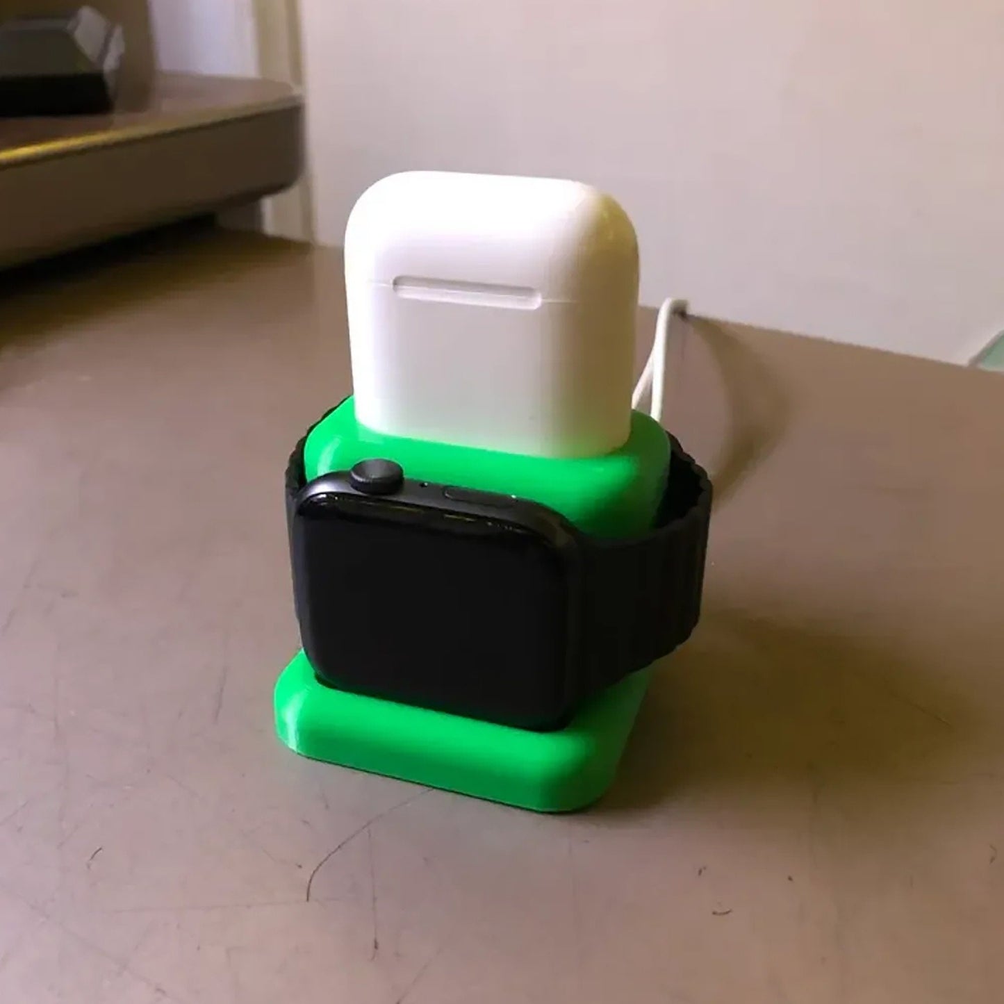 a green and white object sitting on top of a table