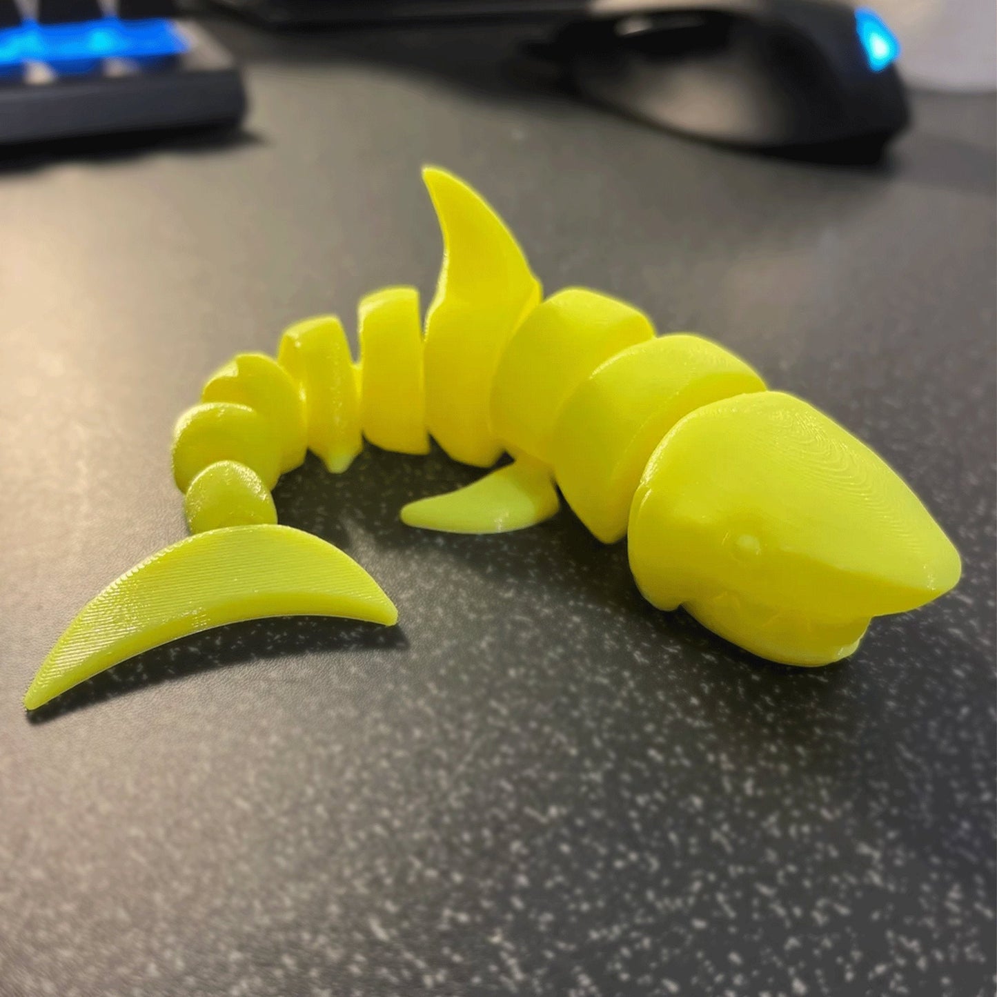 a close up of a yellow object on a table