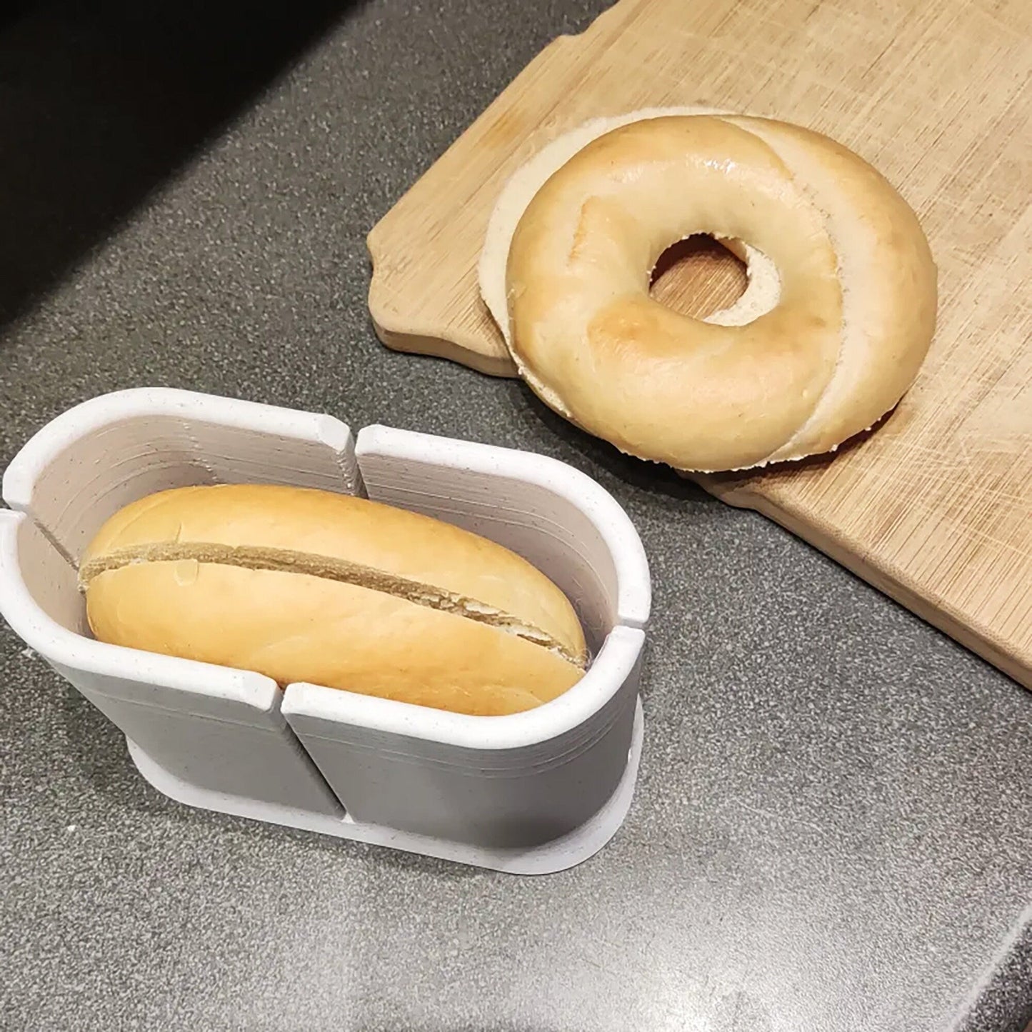 a couple of doughnuts sitting on top of a counter