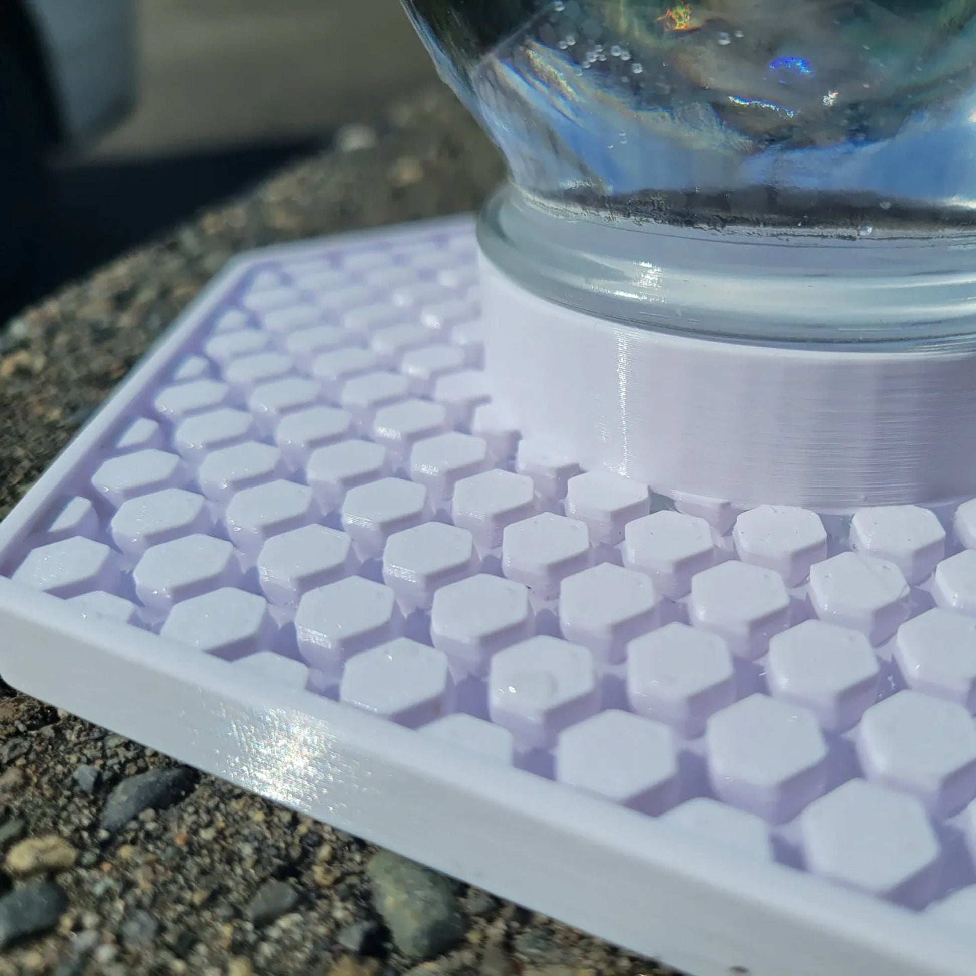 a close up of a white keyboard on a rock