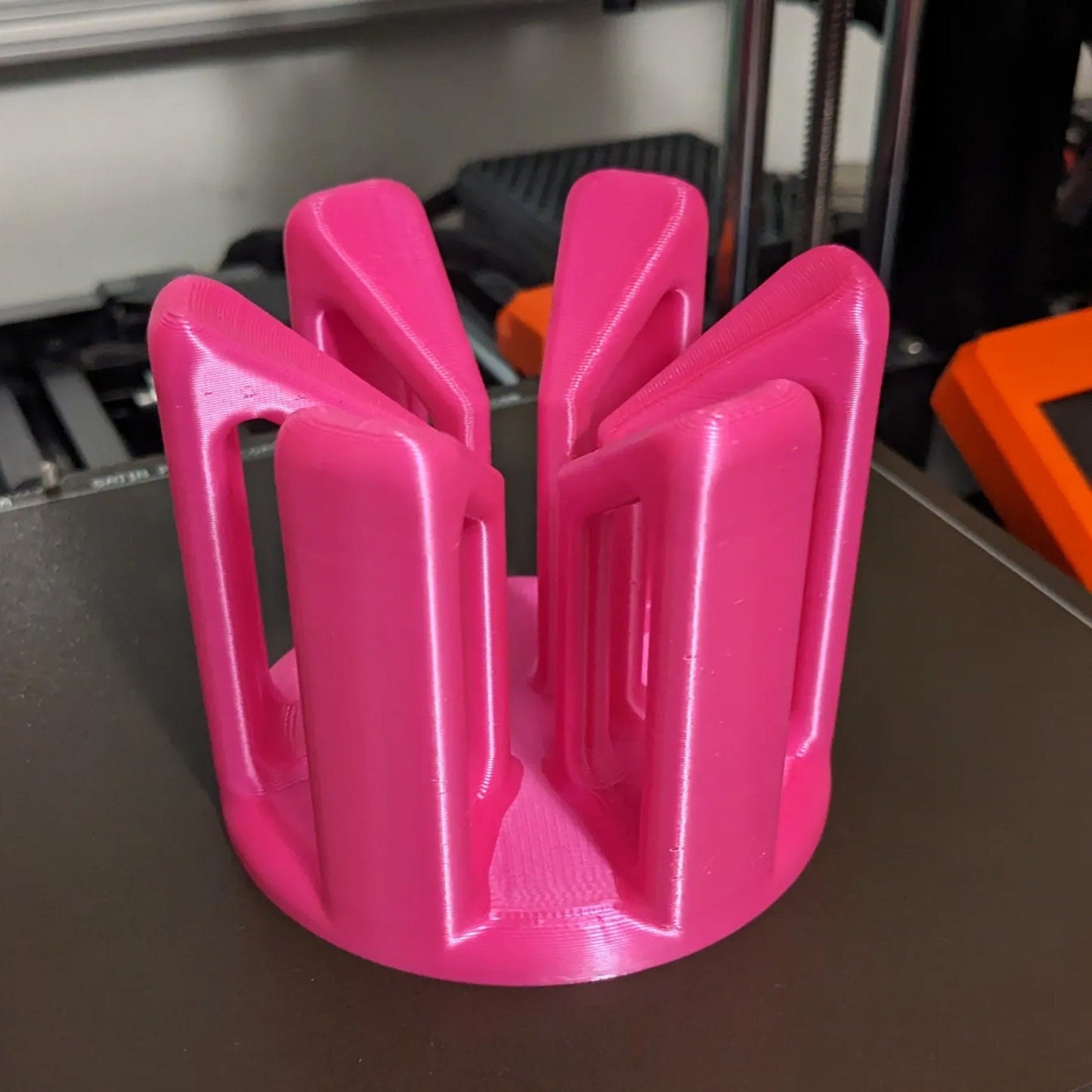 a pink object sitting on top of a table