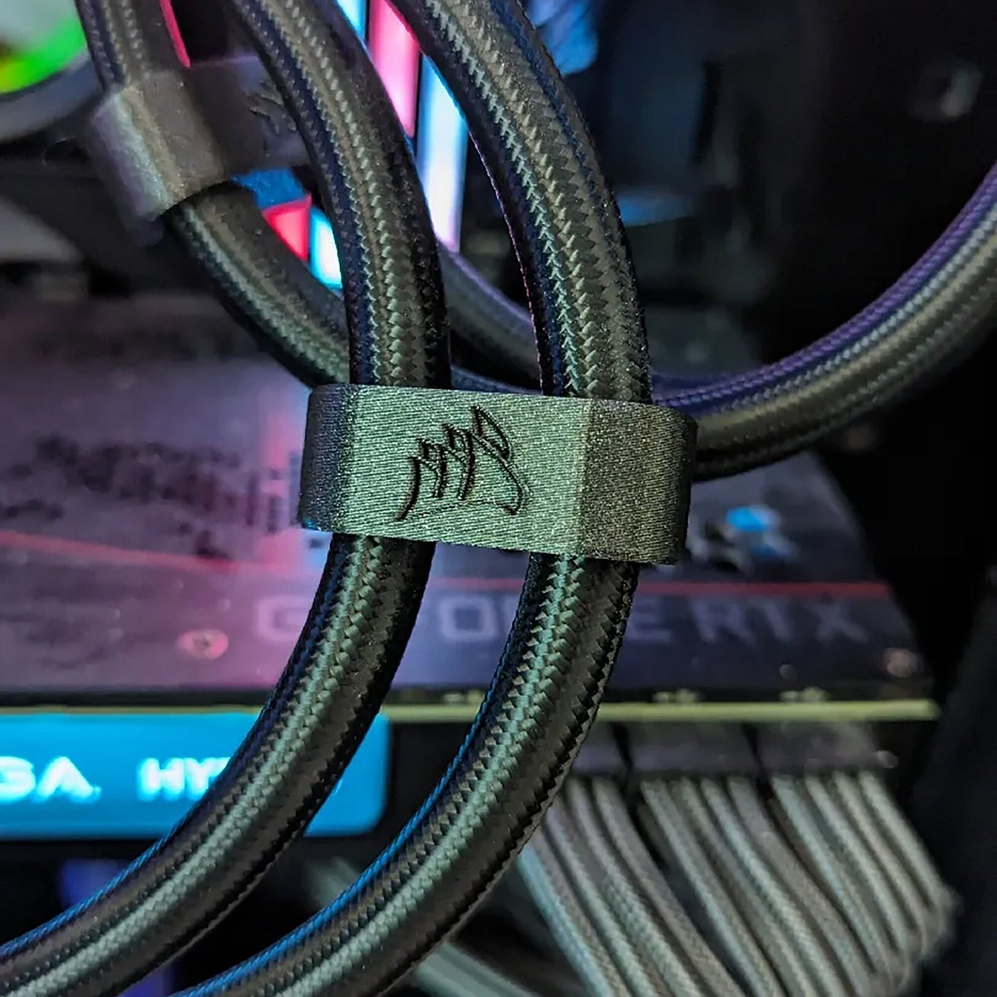 a close up of a cable with a logo on it