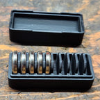 CR1632 coin cell storage box with a slotted tray and lift-off lid, view 2