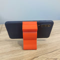 Sitting cat silhouette phone stand for desk and bedside tables