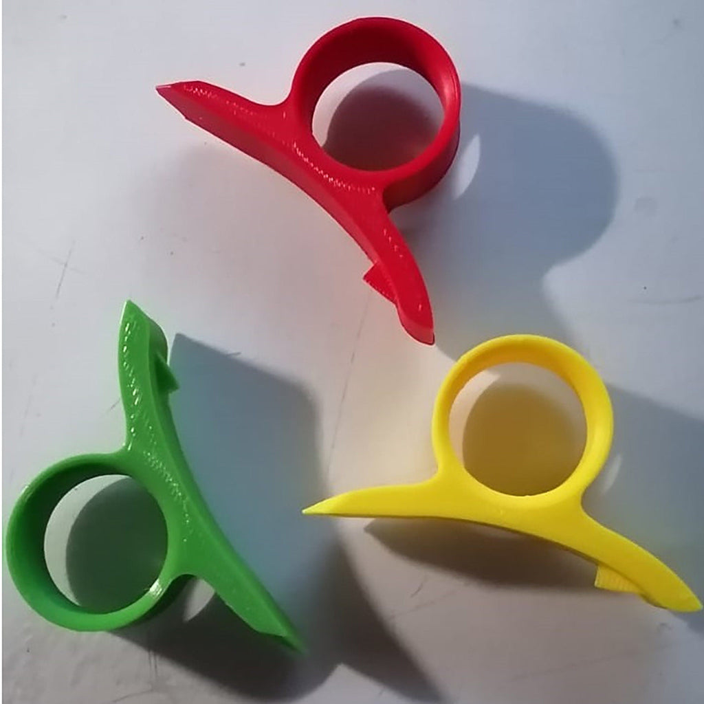 Set of three finger-ring citrus cutters for peeling oranges