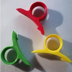 Set of three finger-ring citrus cutters for peeling oranges