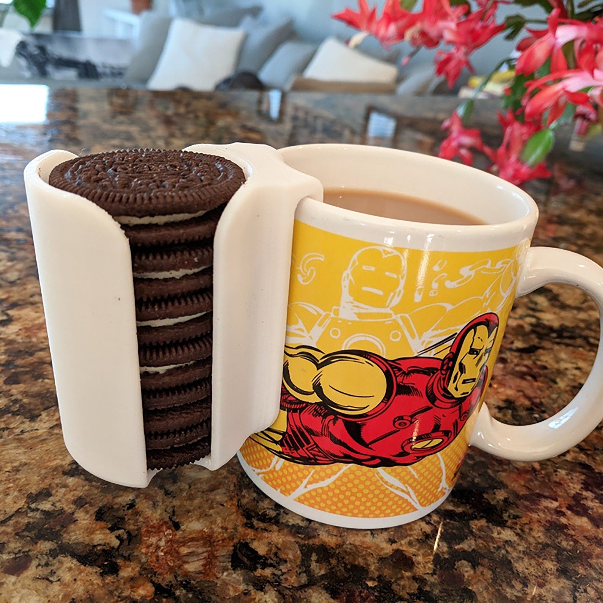 a cookie and a cup of coffee on a table