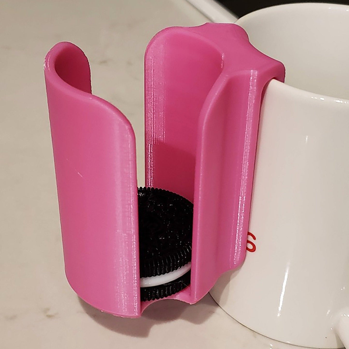 a cup holder with a brush inside of it