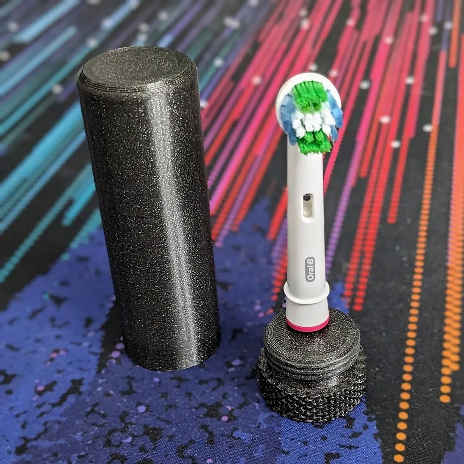 a close up of a tooth brush near a brush holder