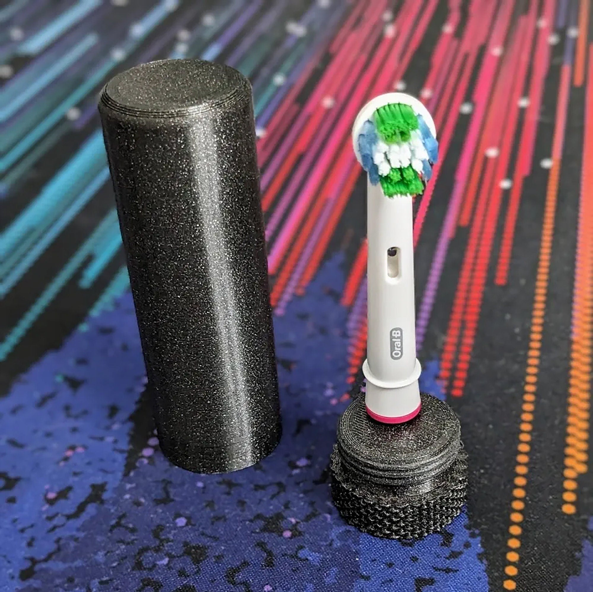 a close up of a tooth brush near a brush holder