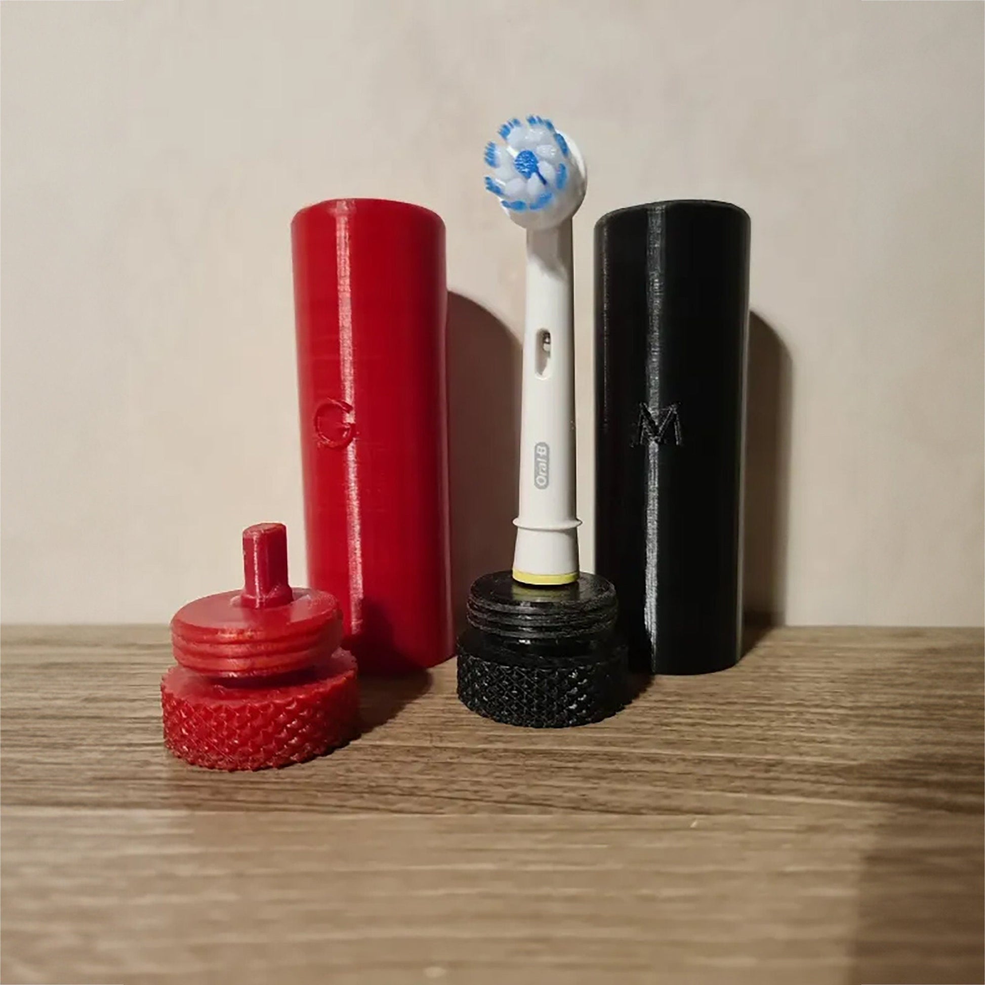 a couple of toothbrushes sitting on top of a wooden table