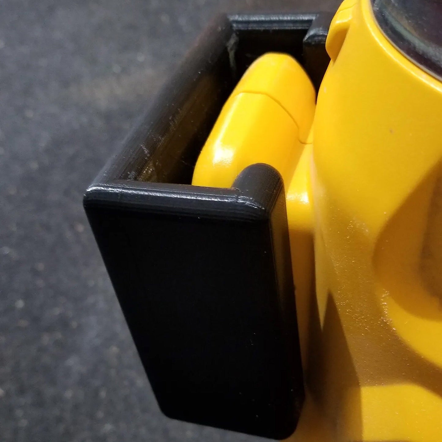 a close up of a yellow object on the ground