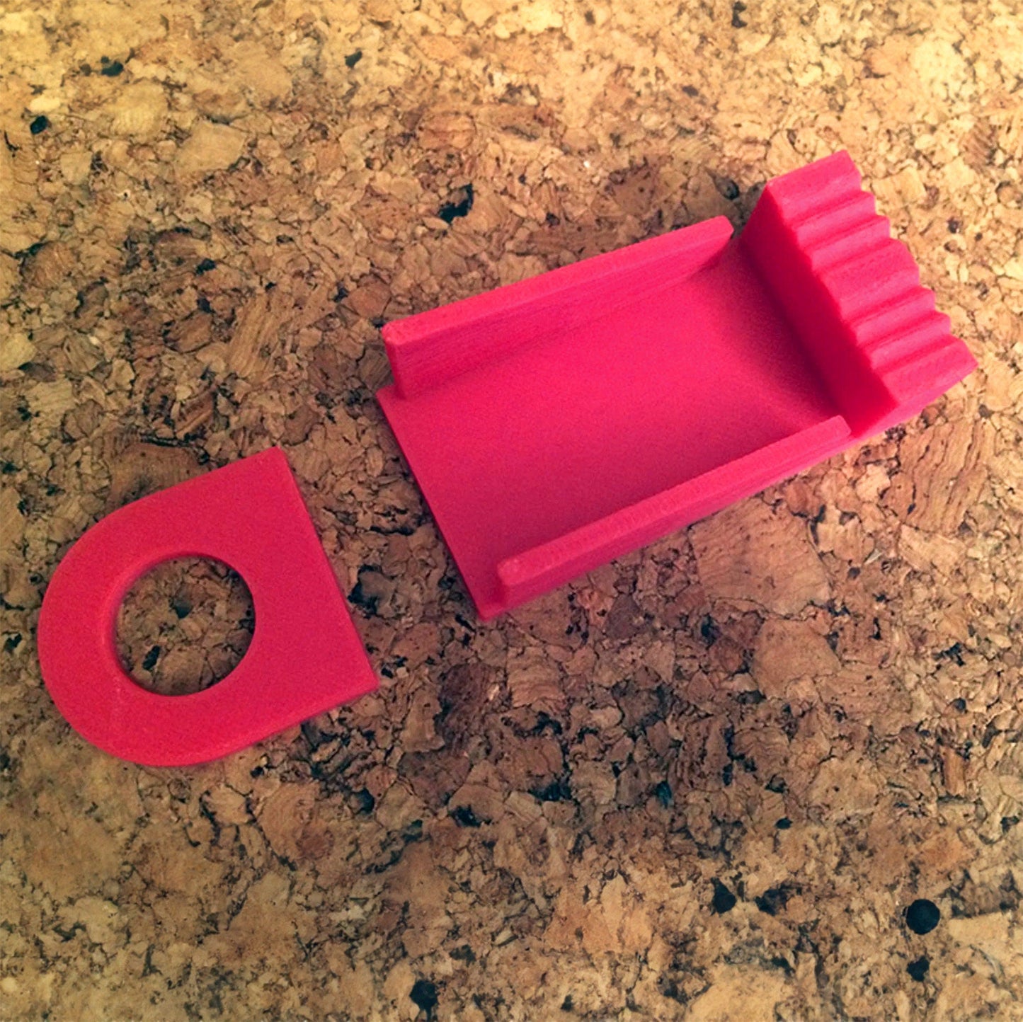 a pink object sitting on top of a counter