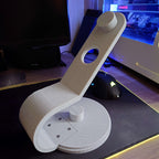 Countertop hair dryer stand with curved arm holding a Dyson Supersonic upright