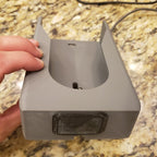 Wall mount charging dock holding a spare Dyson V8 to V15 battery and handle, view 2
