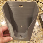 Wall mount charging dock holding a spare Dyson V8 to V15 battery and handle, view 6