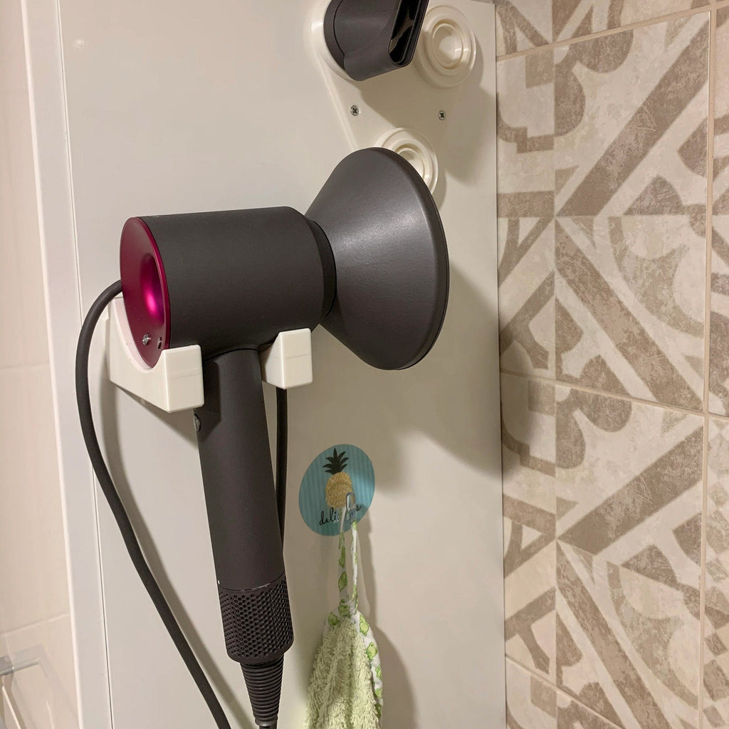Bathroom wall mount holder for Dyson Supersonic hair dryer with cord routed down the wall, view 3
