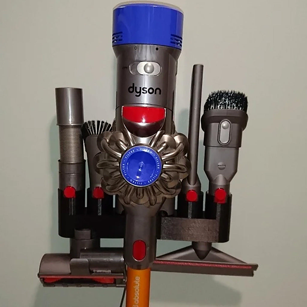 Wall mount attachment holder docking a Dyson V8 vacuum with four tool slots, view 2
