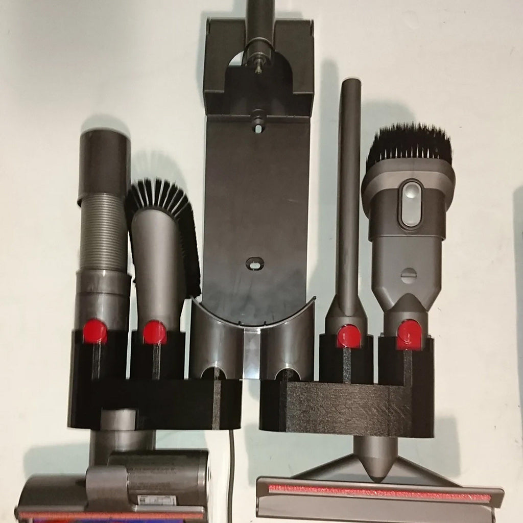 Wall mount attachment holder docking a Dyson V8 vacuum with four tool slots