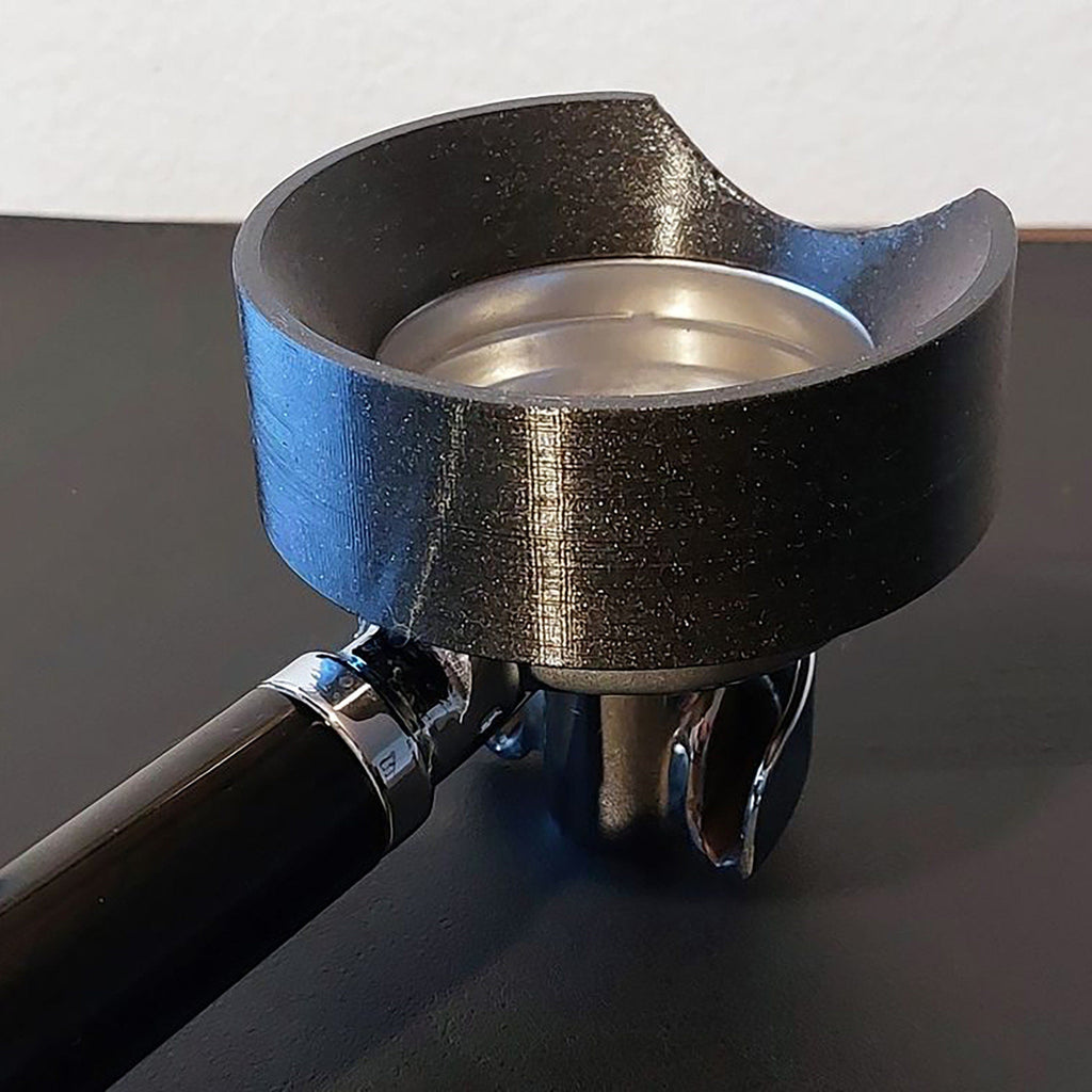 Dosing funnel on an E61 portafilter with notch to clear a Eureka Mignon grinder spout