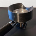 Dosing funnel on an E61 portafilter with notch to clear a Eureka Mignon grinder spout