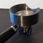 Dosing funnel on an E61 portafilter with notch to clear a Eureka Mignon grinder spout