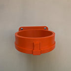 Wall mount holder cradling an EGO Power Plus leaf blower turbo nozzle