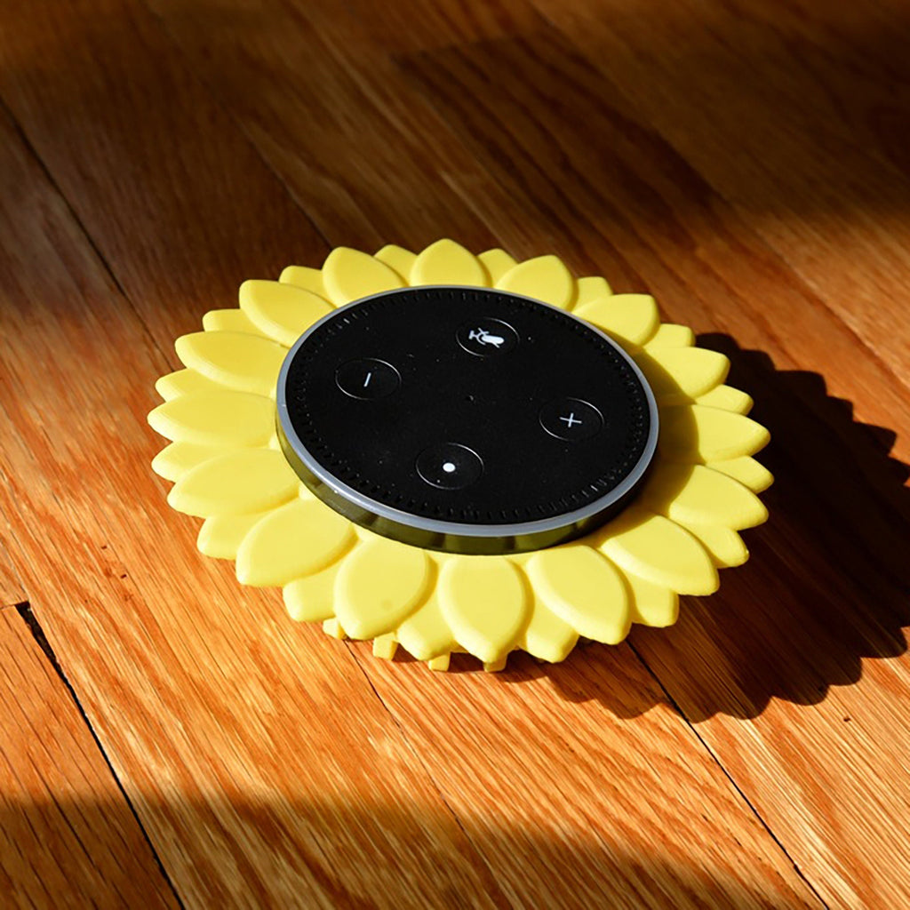 Sunflower stand with layered petals framing a puck-style Echo Dot speaker
