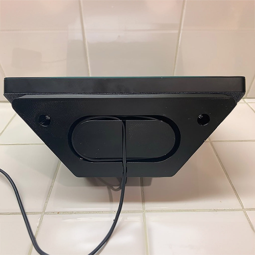 Stand with built-in cable storage under an Echo Show 10 2nd gen display, view 2