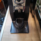 Low-profile drip mat under a Eureka Mignon Specialita coffee grinder, view 2