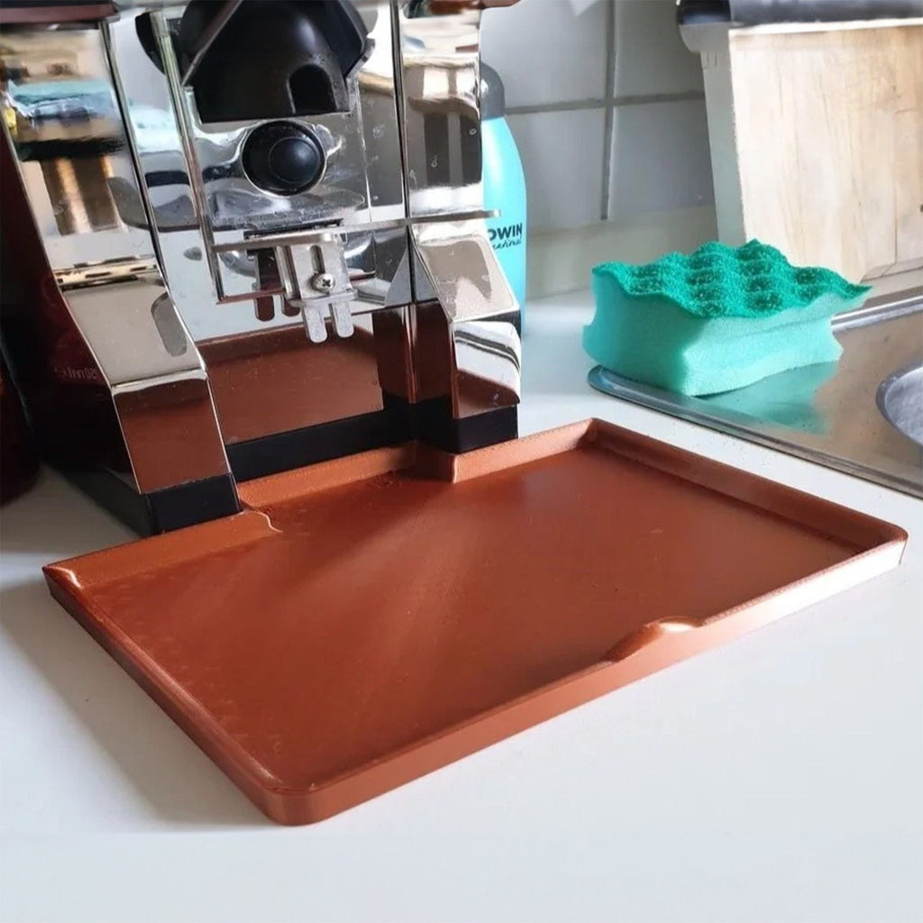 Low-profile drip mat under a Eureka Mignon Specialita coffee grinder
