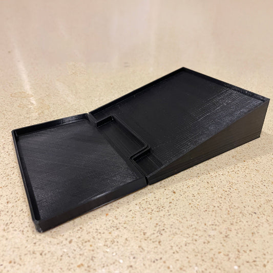 a black tray on a counter top