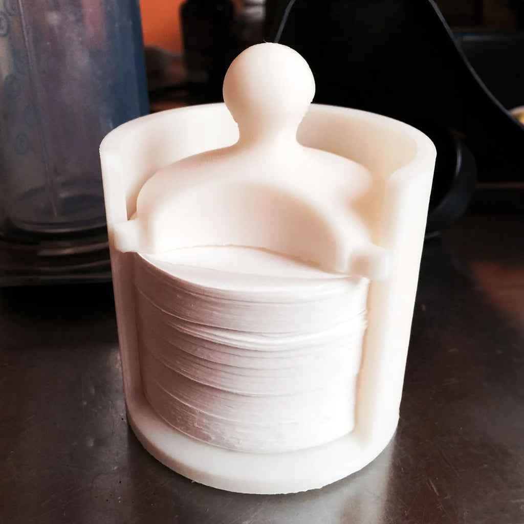 Paper filter dispenser holding a stack of round AeroPress filters, view 2