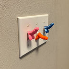 Novelty adult gag toggle caps for standard 15A and 20A light switches, view 2