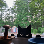 Peeking cat silhouette decoration sitting on a windowsill, view 5