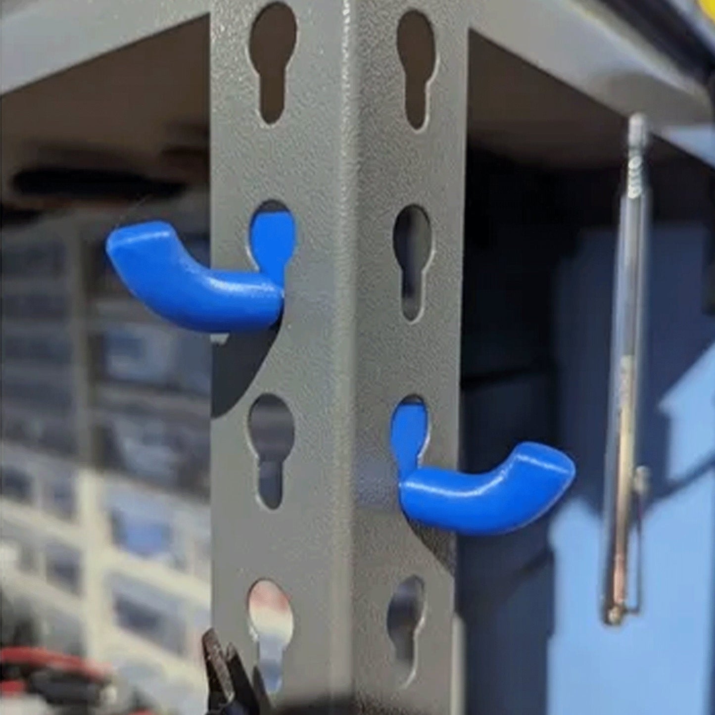 a close up of a metal structure with blue handles