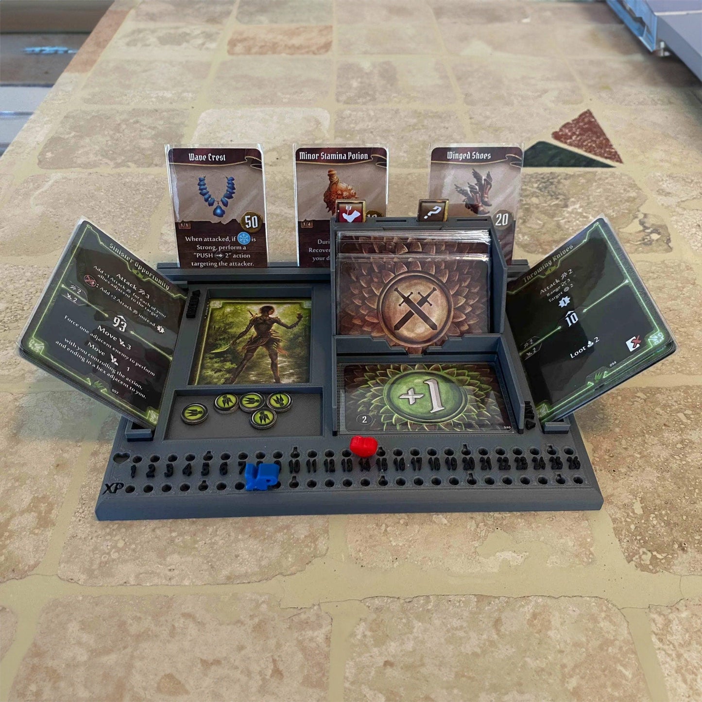 a board game set up on a tile floor