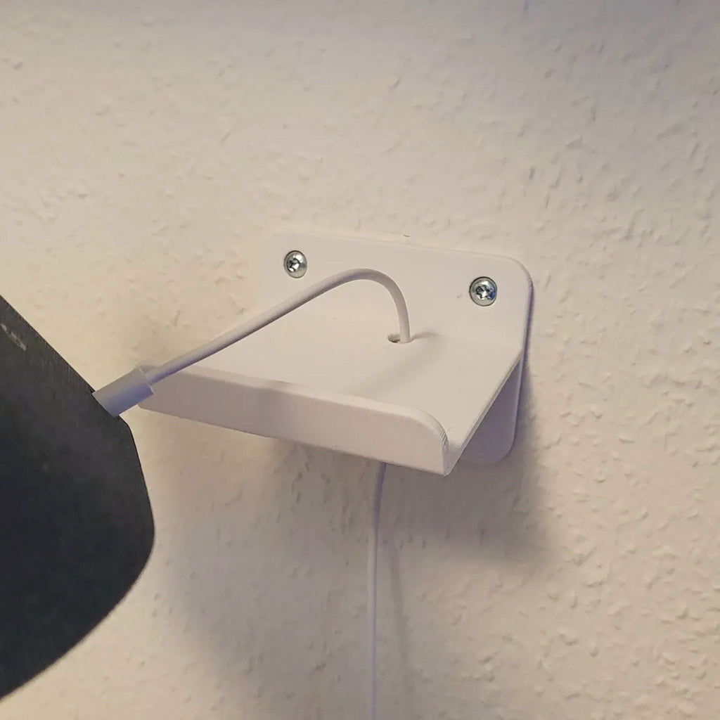Wall mount bracket holding a Google Nest Hub smart display, view 2