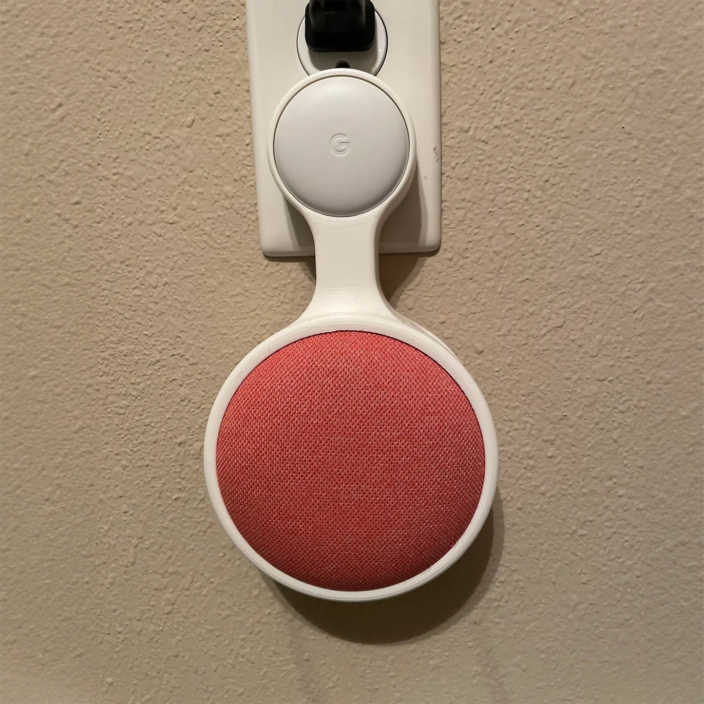 a close up of a red object on a wall