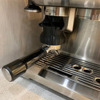 Dosing funnel on a 54mm portafilter basket for Breville Barista espresso machines, view 4