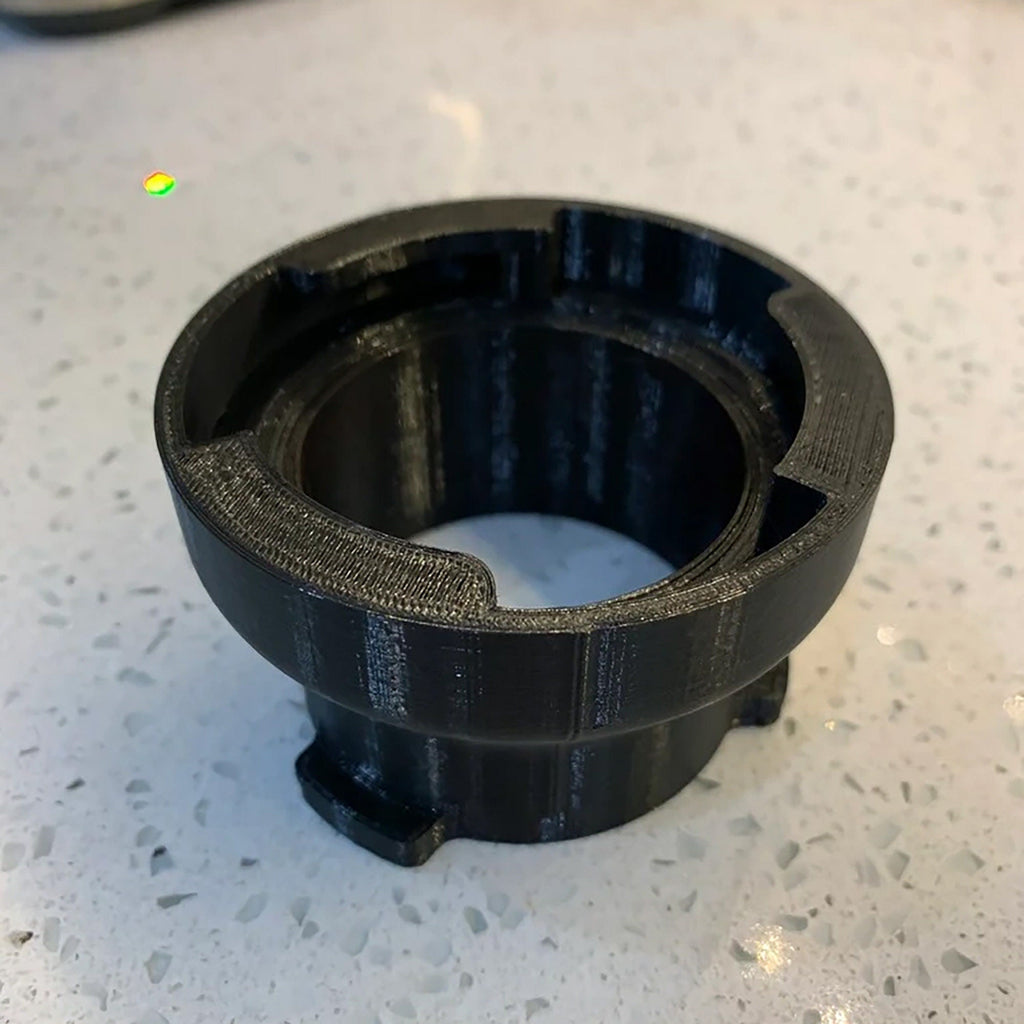 Dosing funnel on a 54mm portafilter basket for Breville Barista espresso machines, view 5