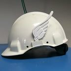 Pair of feathered clip-on wings on the sides of a construction hard hat, view 4